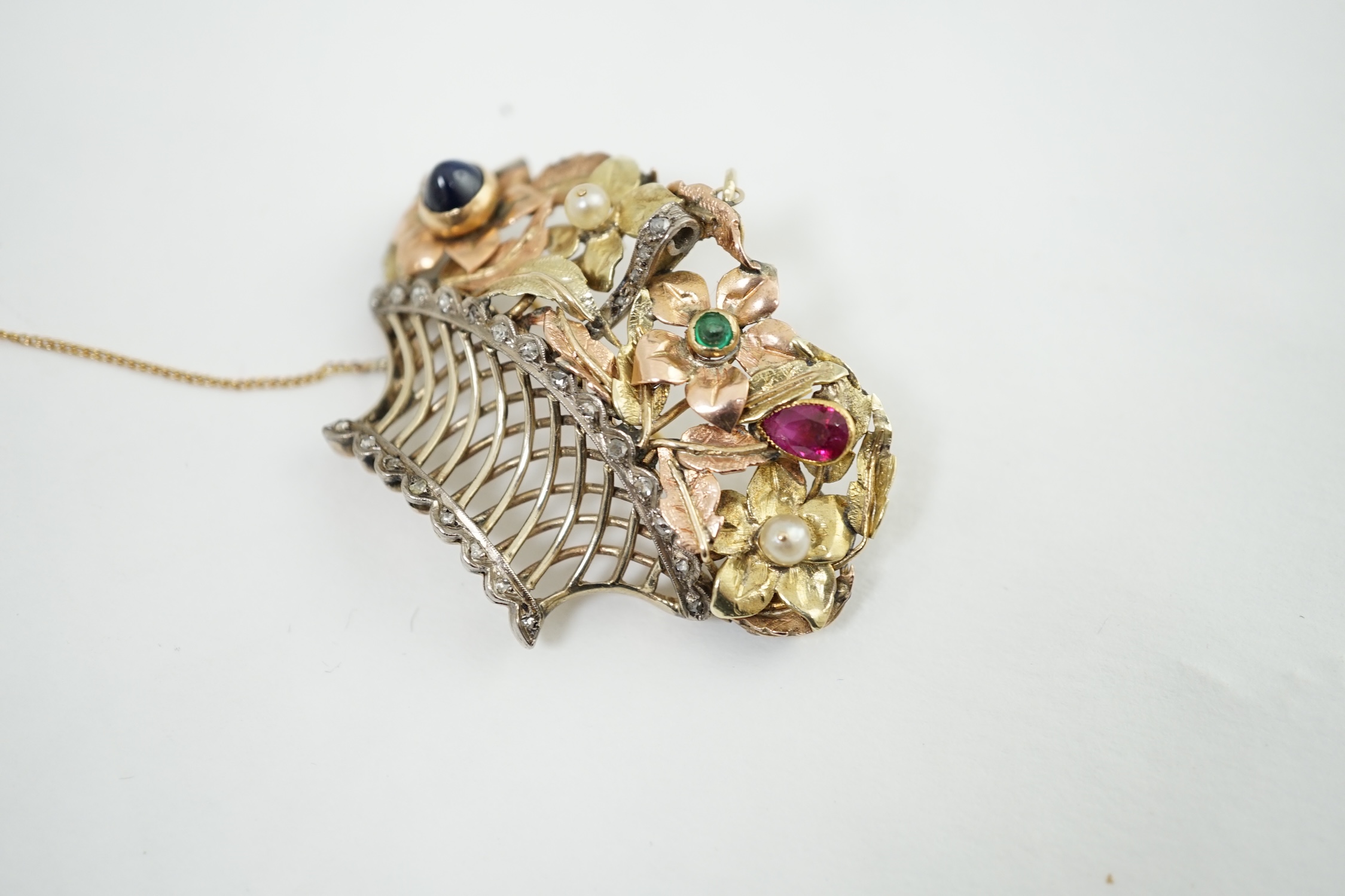 A late 19th century Continental two colour gold, silver, diamond, sapphire, ruby, emerald and pearl set giardinetto pendant brooch